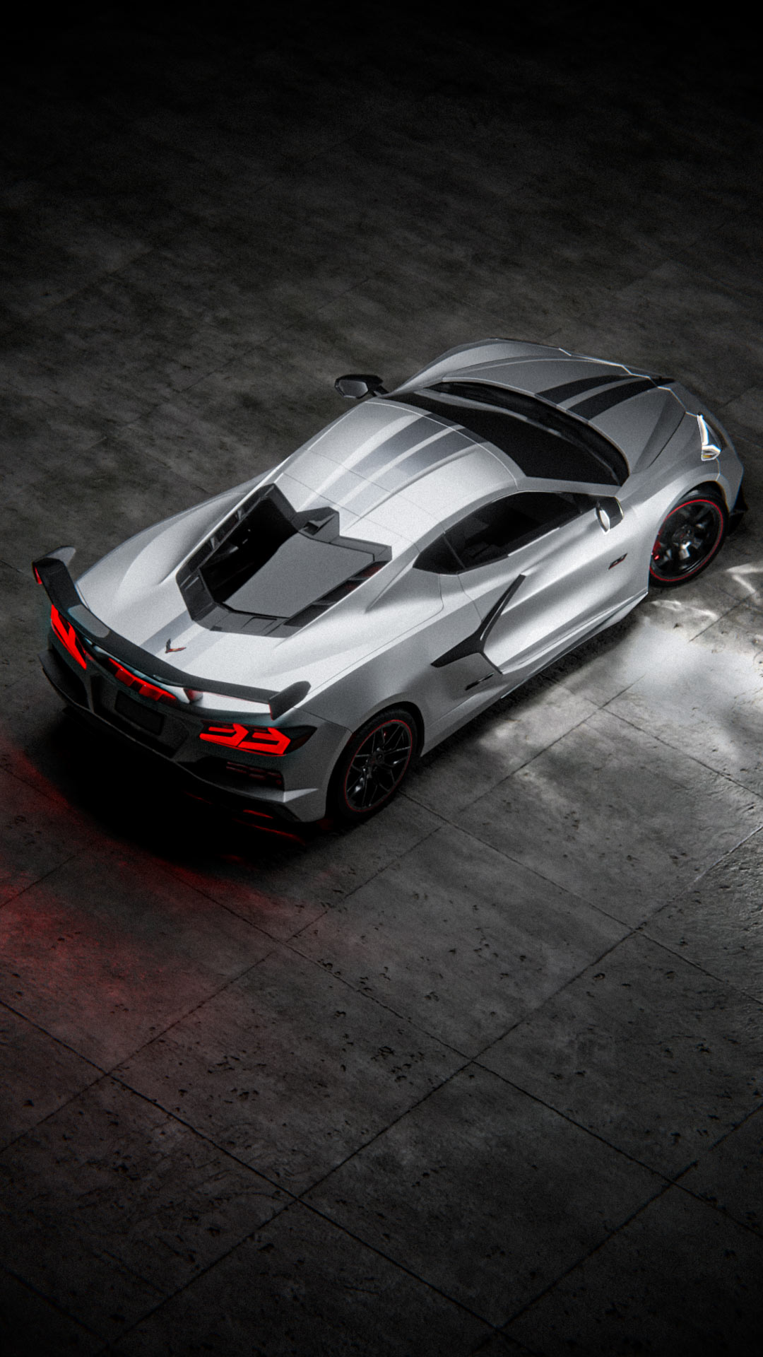 Silver Corvette C8 Z06 In A Warehouse With Caustics Render